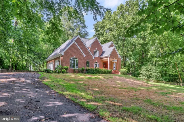 a front view of a house with yard