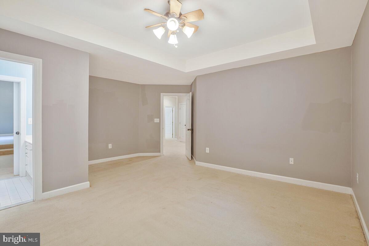502 Seneca Knoll Court Great Falls, VA 22066 - Photo 30 of 56 a view of an empty room with a window