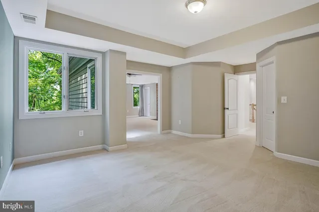 a utility room with sink dryer and washer