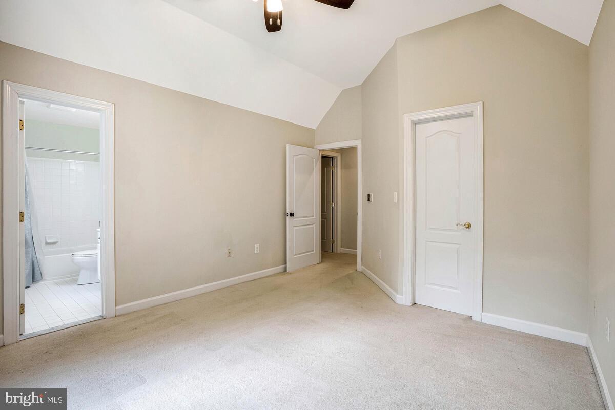 502 Seneca Knoll Court Great Falls, VA 22066 - Photo 37 of 56 a view of an empty room and a bathroom