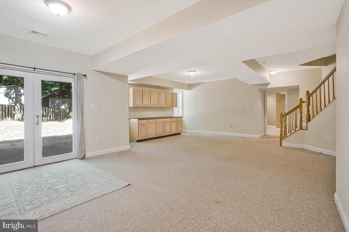 502 Seneca Knoll Court Great Falls, VA 22066 - Photo 42 of 56 a view of an empty room with a window