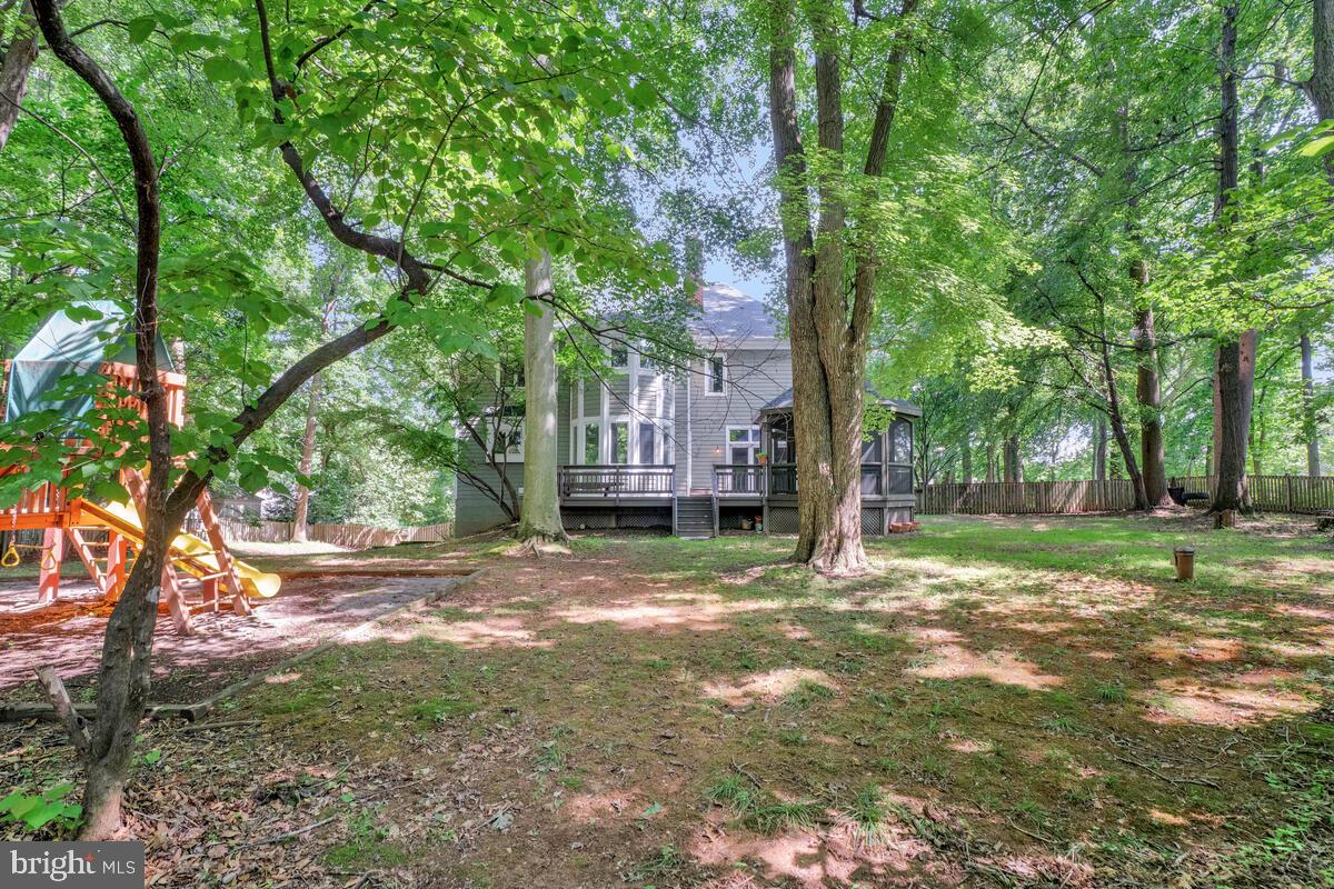 502 Seneca Knoll Court Great Falls, VA 22066 - Photo 49 of 56 a view of a yard with large trees