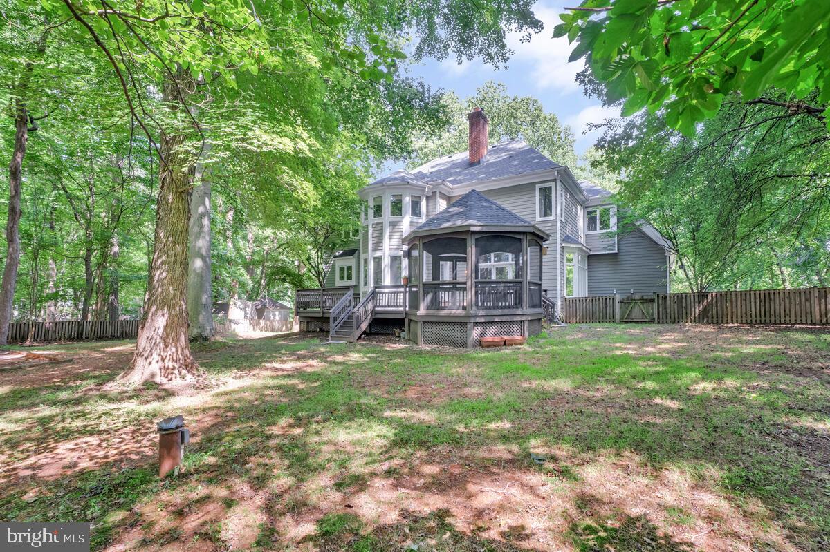 502 Seneca Knoll Court Great Falls, VA 22066 - Photo 51 of 56 a house with green field in front of it