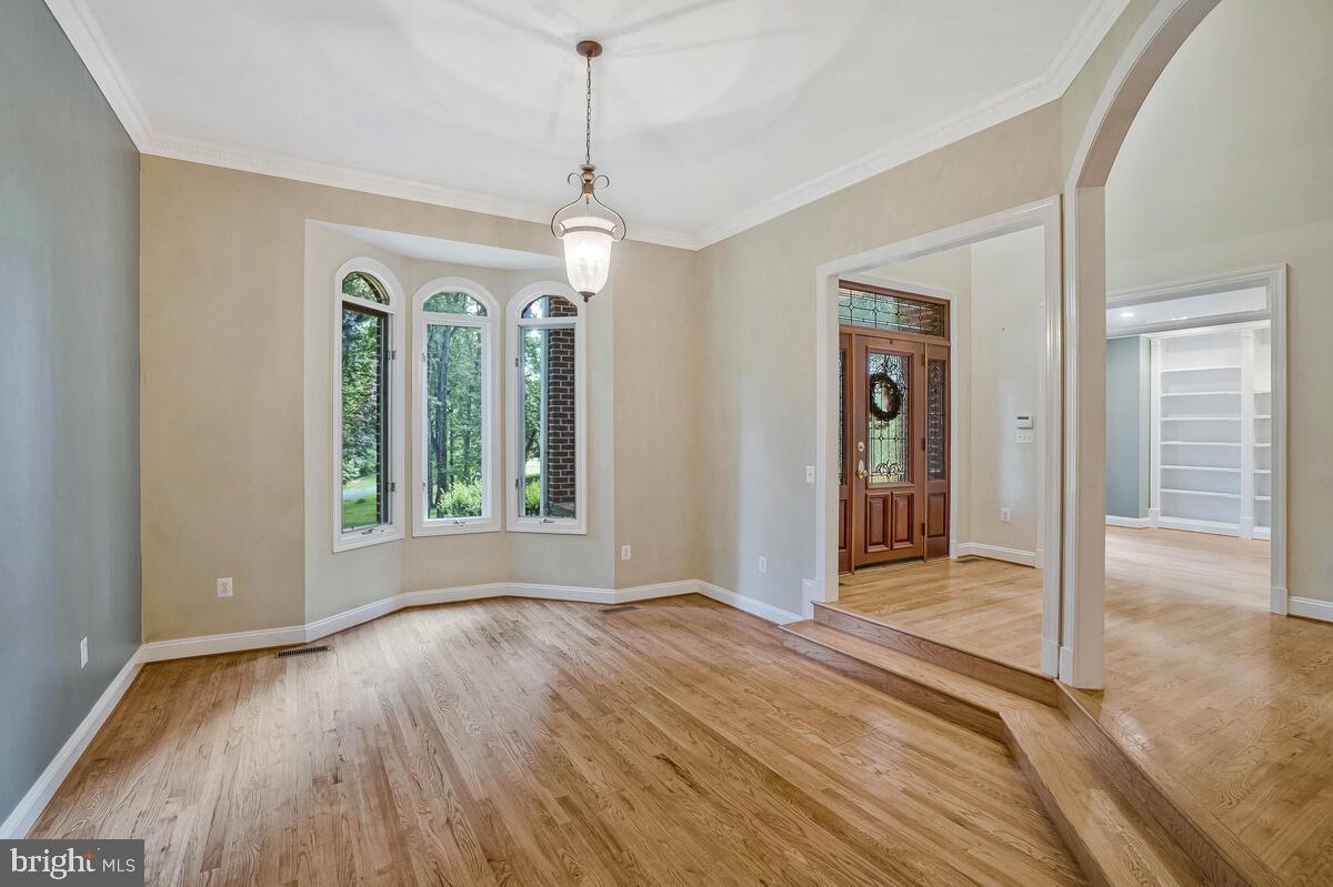 502 Seneca Knoll Court Great Falls, VA 22066 - Photo 9 of 56 a view of livingroom with hardwood floor and window