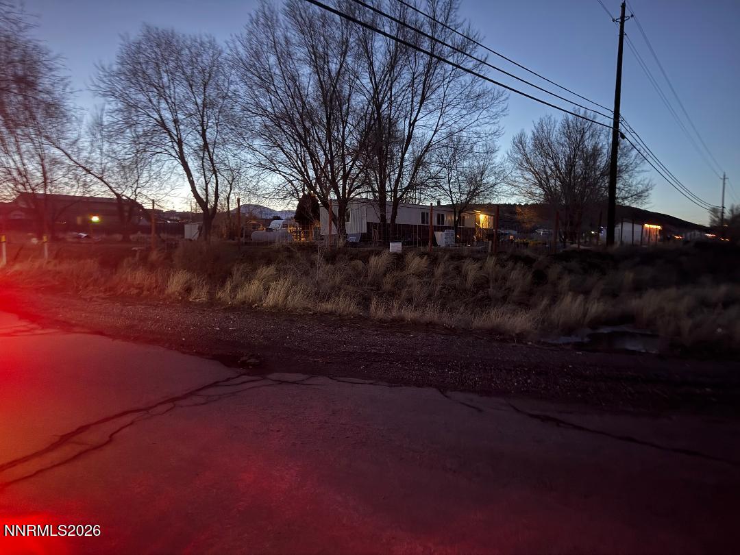 18165 Highway 395 Reno, NV 89508 - Photo 3 of 3 a backyard of a house with lots of green space