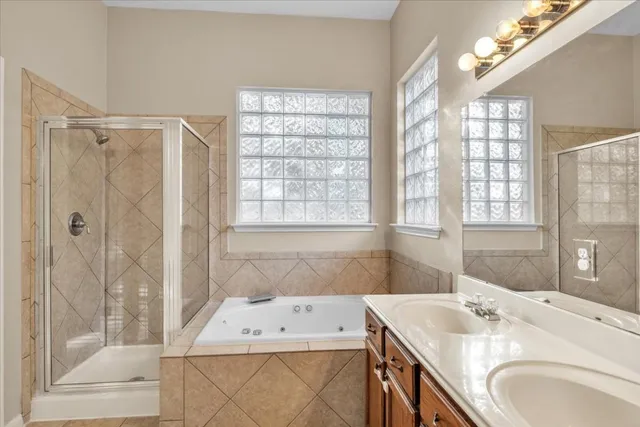 a kitchen with stainless steel appliances a sink and cabinets