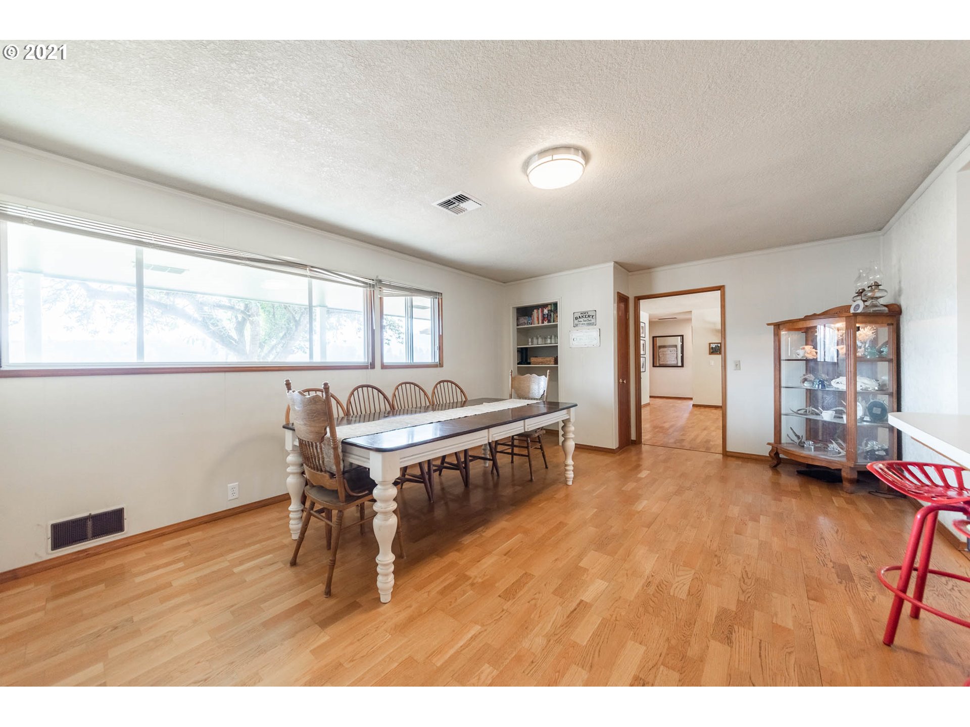 37931 M J Chase Road Springfield, OR 97478 - Photo 11 of 32 a living room with furniture a window and a table