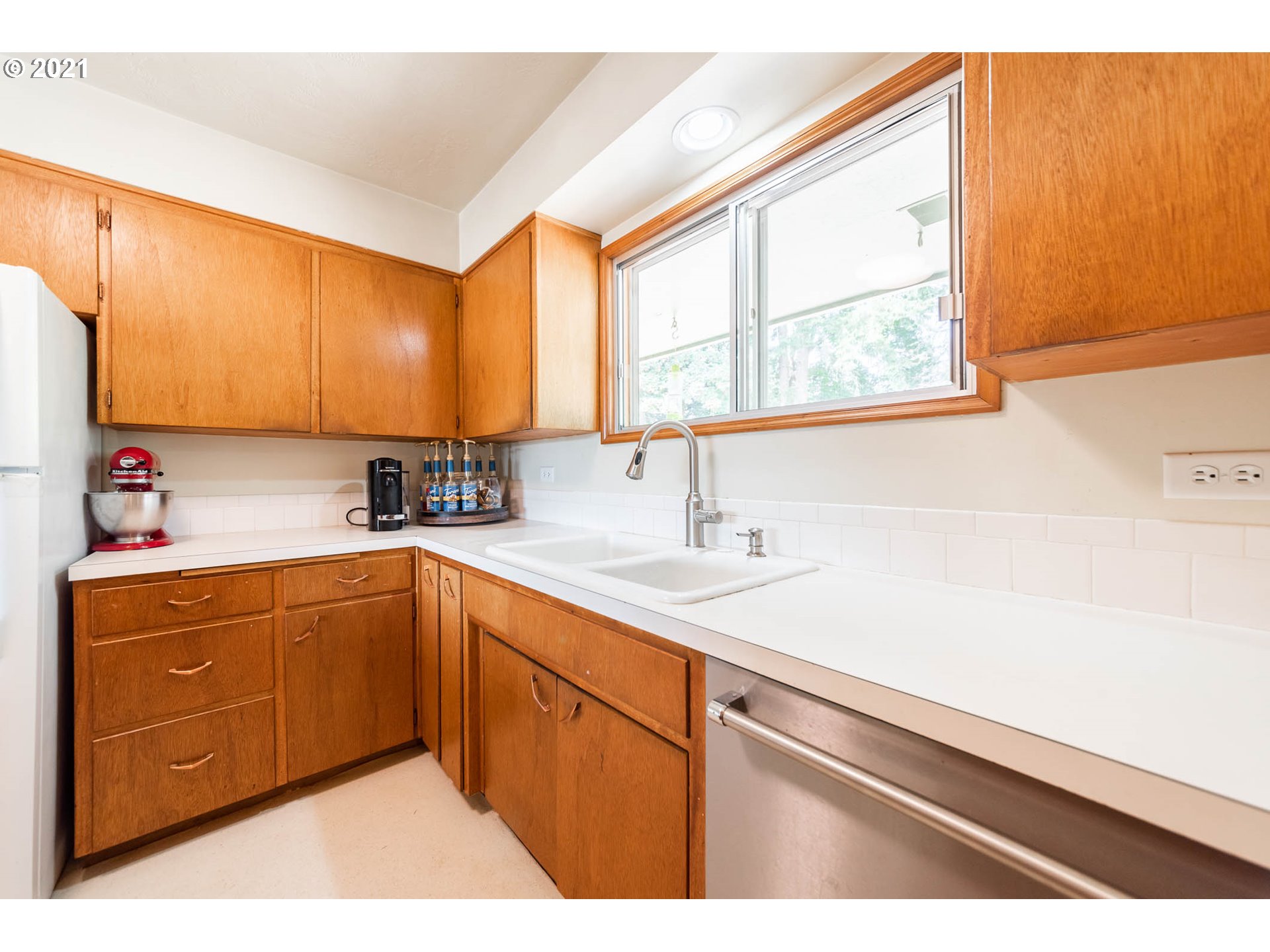 37931 M J Chase Road Springfield, OR 97478 - Photo 13 of 32 a kitchen with a sink cabinets and window