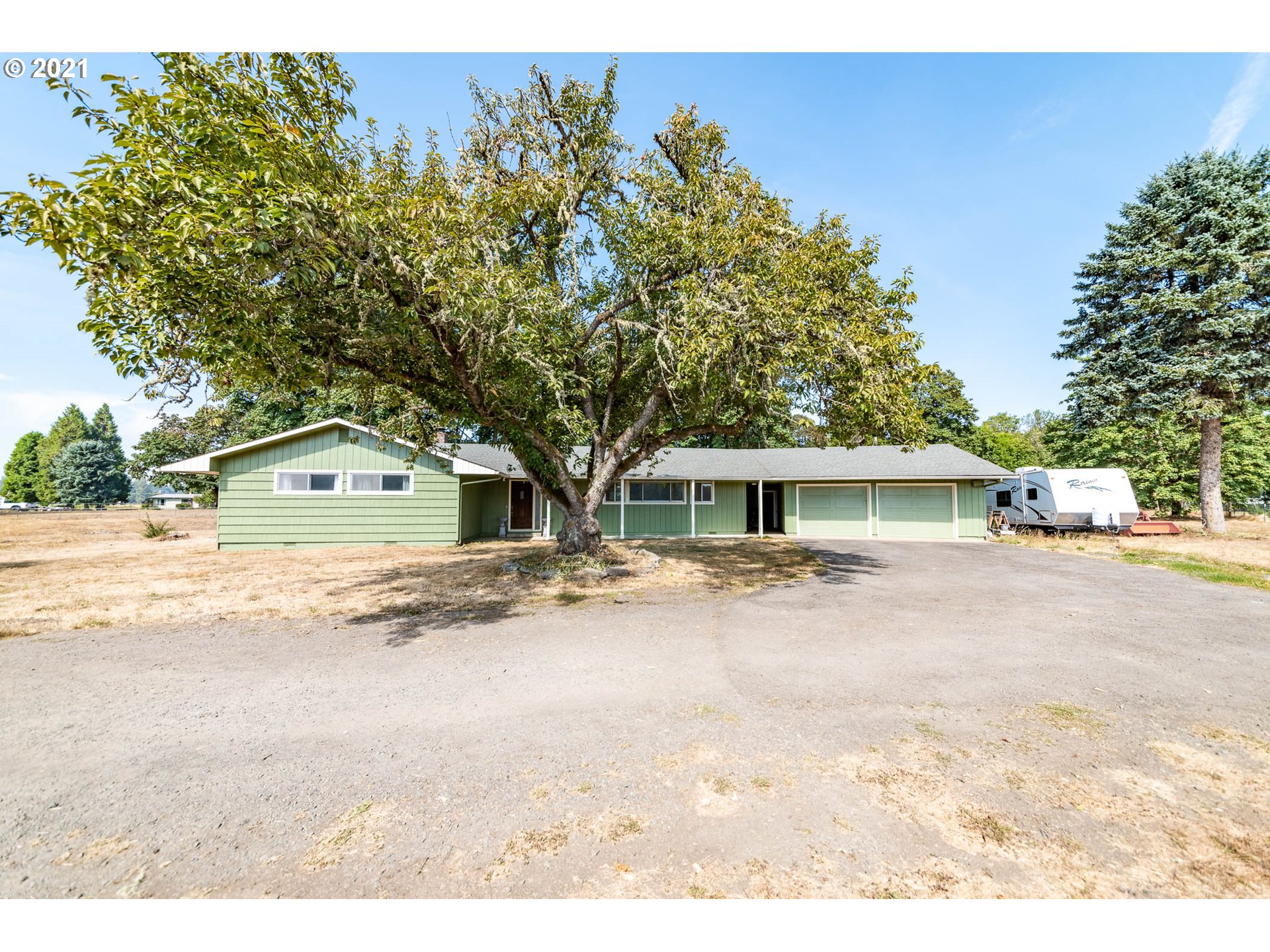 37931 M J Chase Road Springfield, OR 97478 - Photo 2 of 32 a view of a house with a tree in front of it