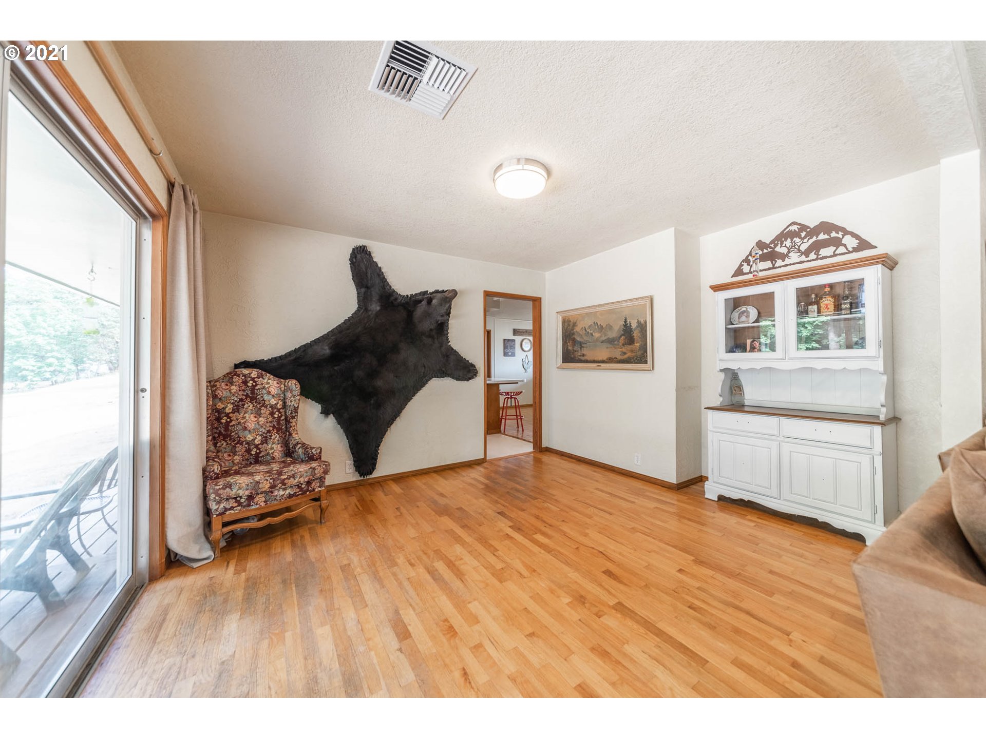 37931 M J Chase Road Springfield, OR 97478 - Photo 8 of 32 a view of a living room and hardwood floor