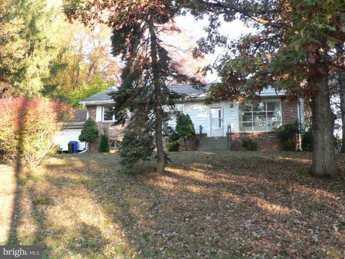 1222 Brantford Avenue Silver Spring, MD 20904 - Photo 1 of 1 a view of a house with a yard