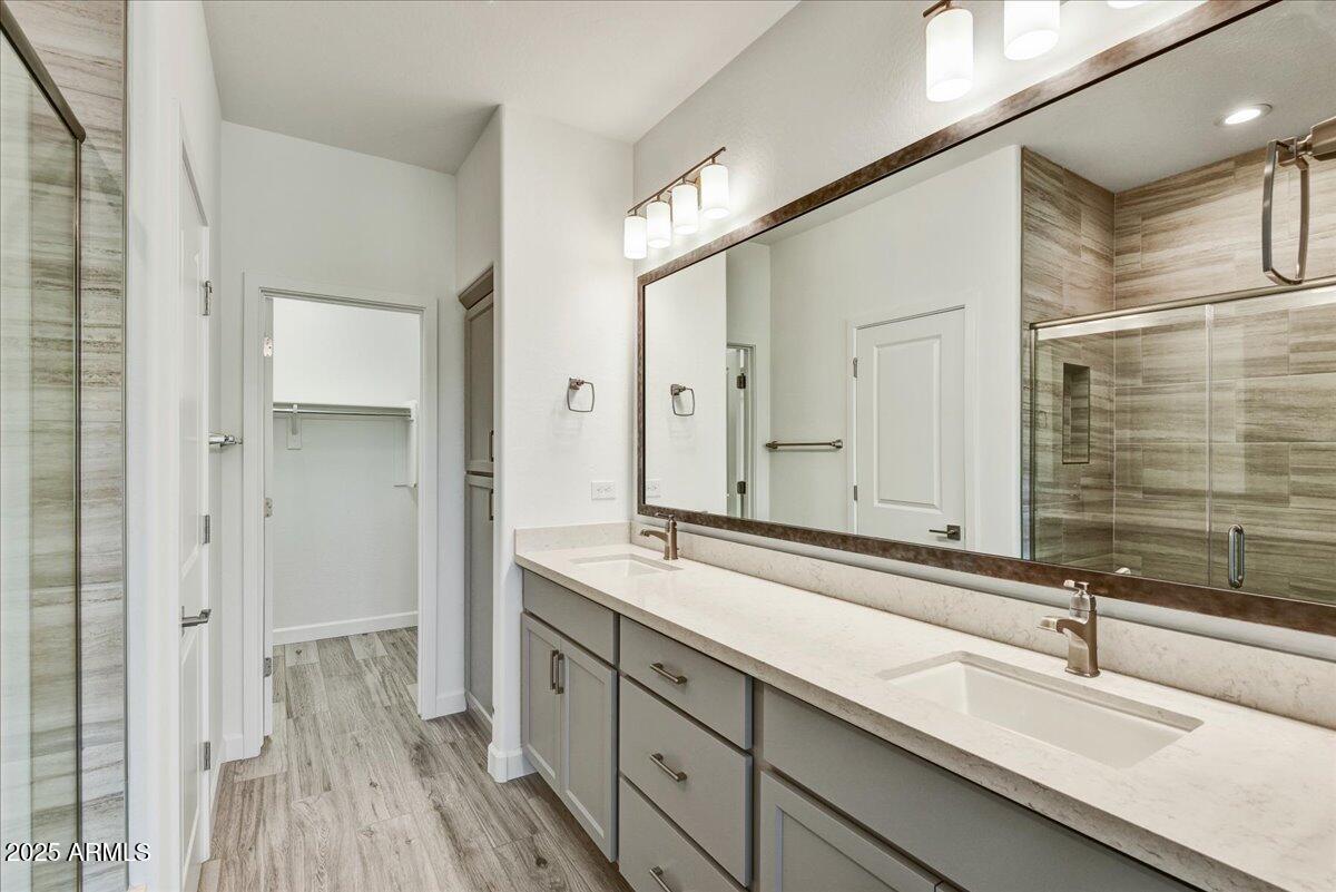 18230 East Coronado Cave Court Rio Verde, AZ 85263 - Photo 18 of 49 a spacious bathroom with double sink and a mirror