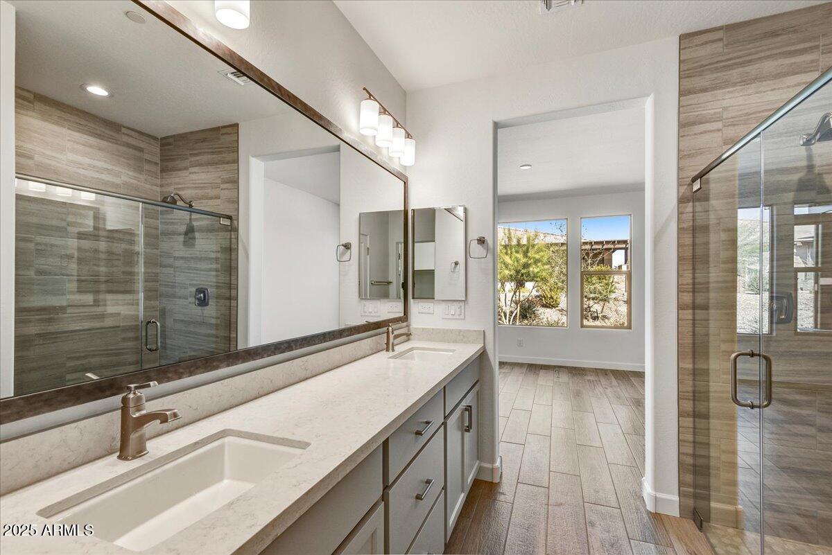 18230 East Coronado Cave Court Rio Verde, AZ 85263 - Photo 19 of 49 a bathroom with a sink and a large mirror
