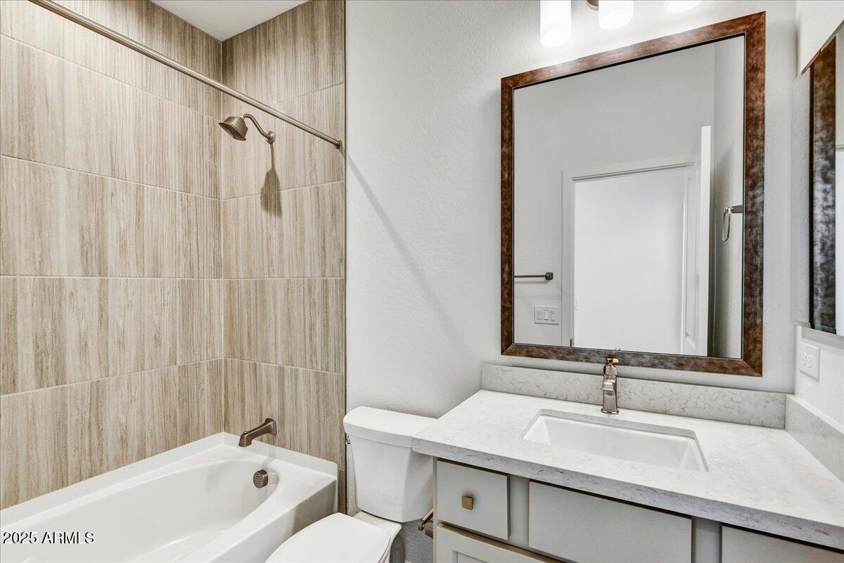 18230 East Coronado Cave Court Rio Verde, AZ 85263 - Photo 22 of 49 a bathroom with a sink and a mirror