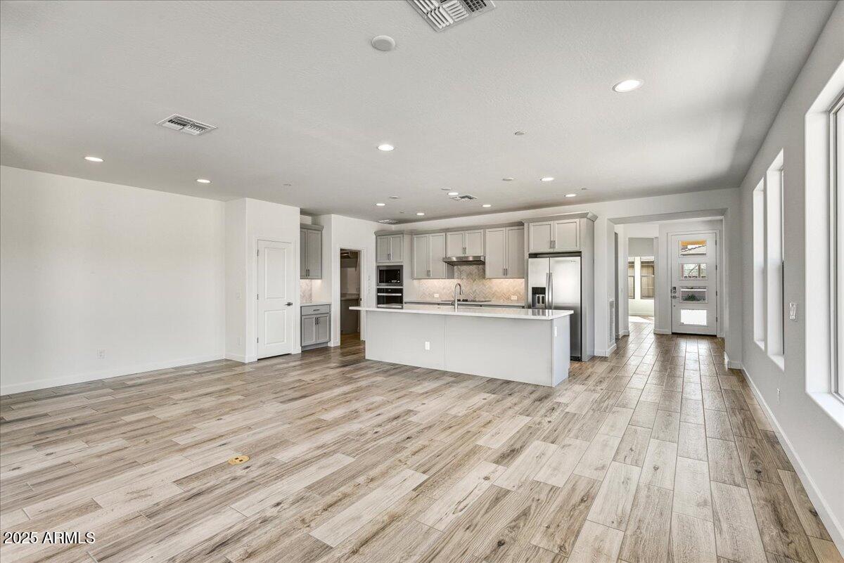 18230 East Coronado Cave Court Rio Verde, AZ 85263 - Photo 10 of 49 a view of kitchen with wooden floor