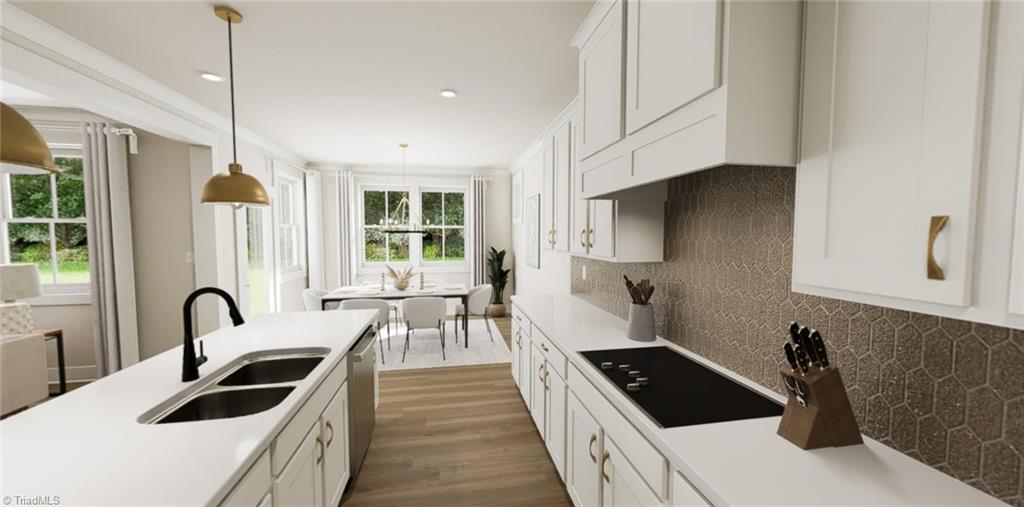 6716 Honeycutt Reserve Drive Oak Ridge, NC 27310 - Photo 9 of 23 Kitchen & Dining Room-Virtual Representation Not actual home - Some Features may be different in actual home.