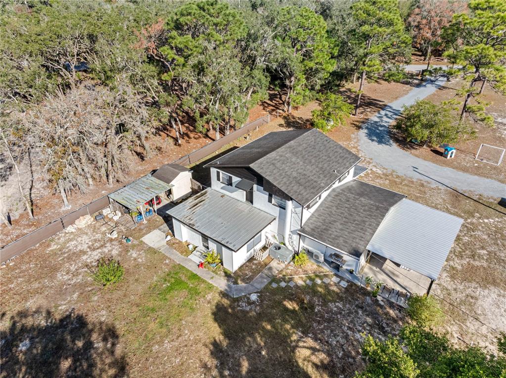 14450 Lancer Road Spring Hill, FL 34610 - Photo 15 of 46 an aerial view of residential house with outdoor space