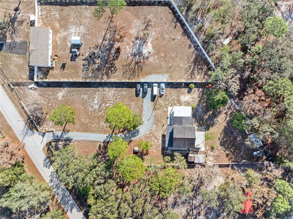 14450 Lancer Road Spring Hill, FL 34610 - Photo 8 of 46 an aerial view of a house with outdoor space