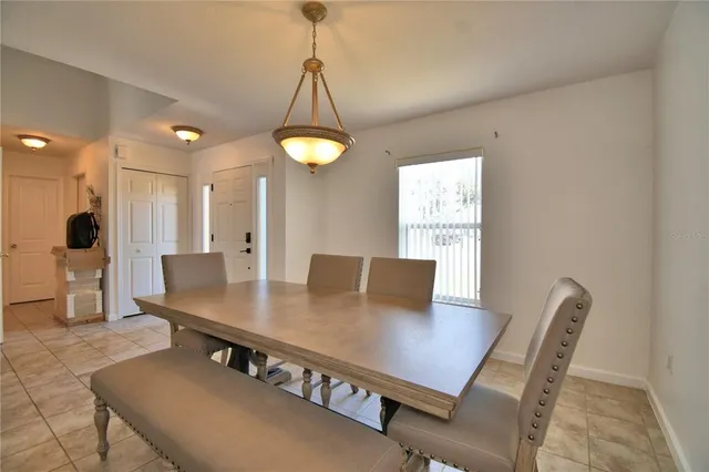 a view of a living room and bedroom