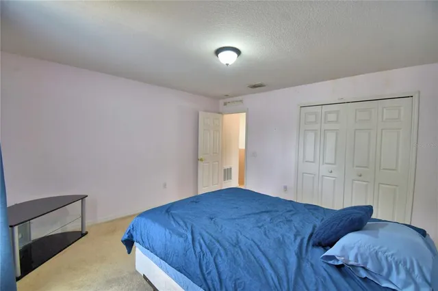 a kitchen with stainless steel appliances a stove and a refrigerator