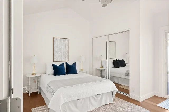 a bedroom with a bed and chair