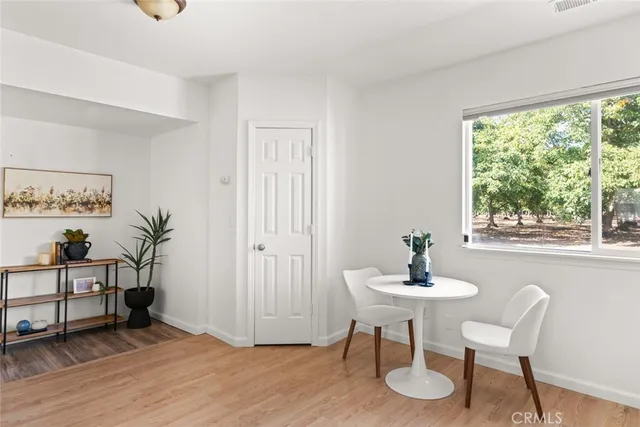 a bathroom with a sink a mirror and a shower curtain
