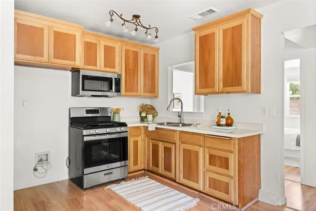 a spacious bedroom with a bed and a couch