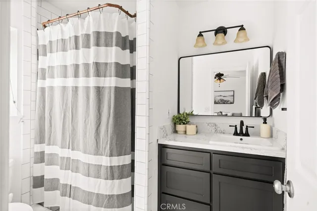 a view of house with swimming pool and sitting area