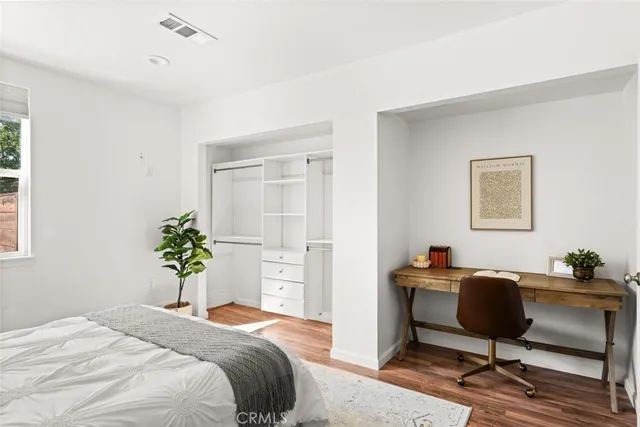 a view of backyard with swimming pool