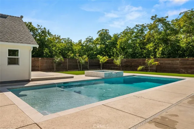 a view of house that has a yard