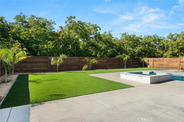 a fire hydrant in the middle of a field