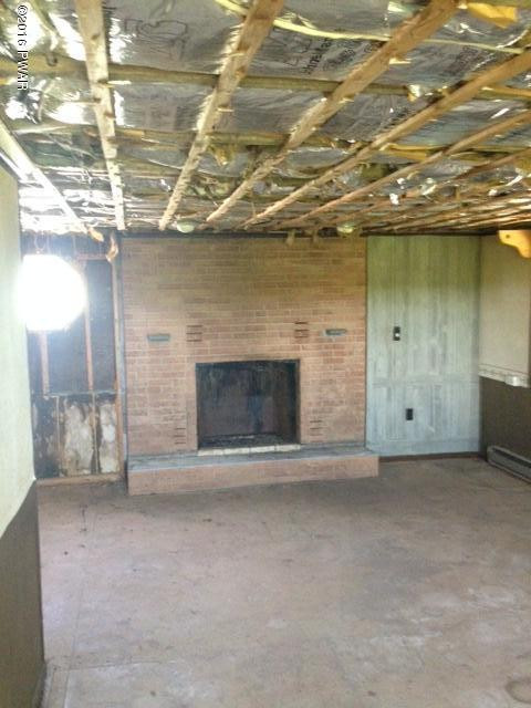 Rear Wesser Road Moscow, PA 18444 - Photo 5 of 10 a view of empty room with a fireplace