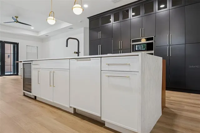 a bathroom with a double vanity sink and mirror