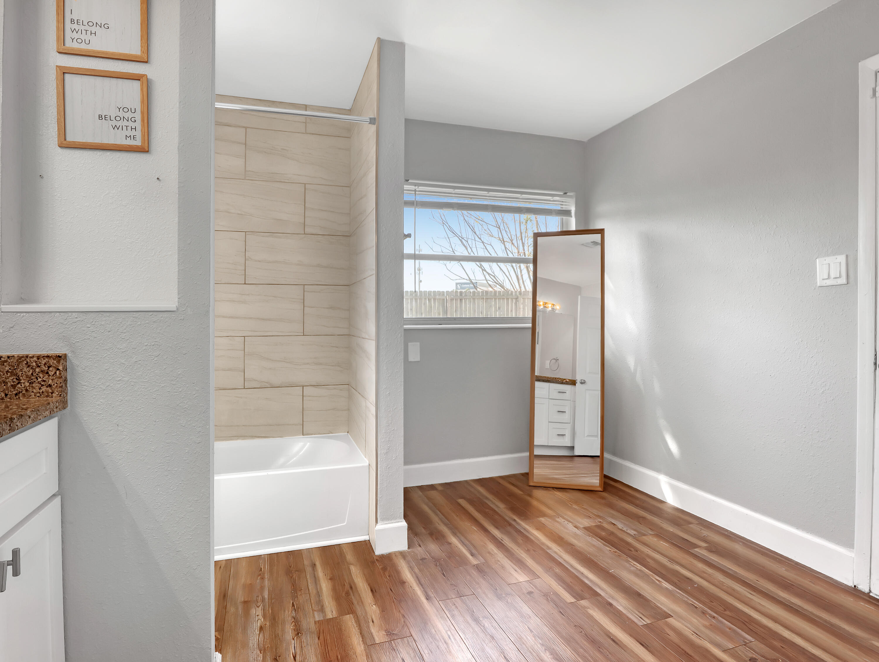2711 Locksley Road Melbourne, FL 32935 - Photo 22 of 34 a bathroom with a bathtub and shower