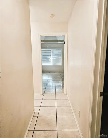 a view of a chairs and table in backyard