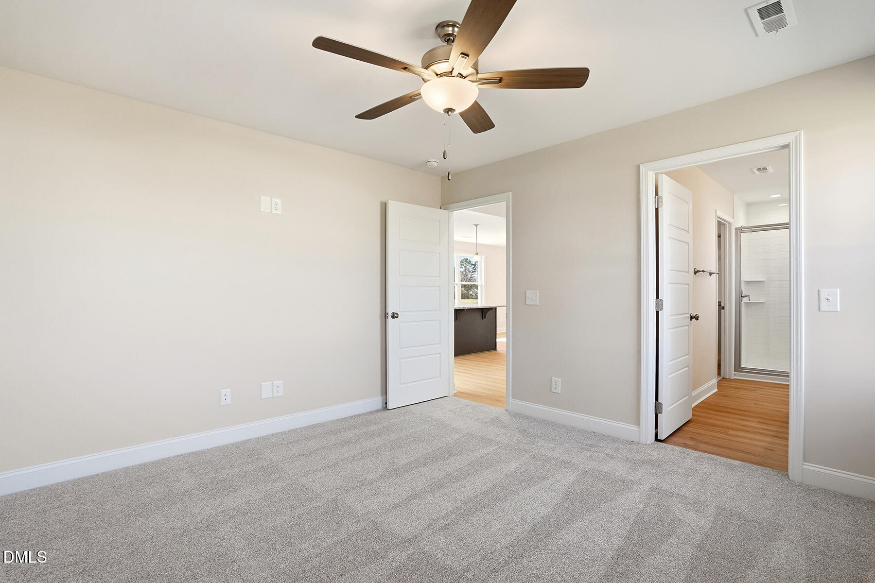 232 Rae Street Warsaw, NC 28398 - Photo 22 of 31 a view of an empty room with a ceiling fan