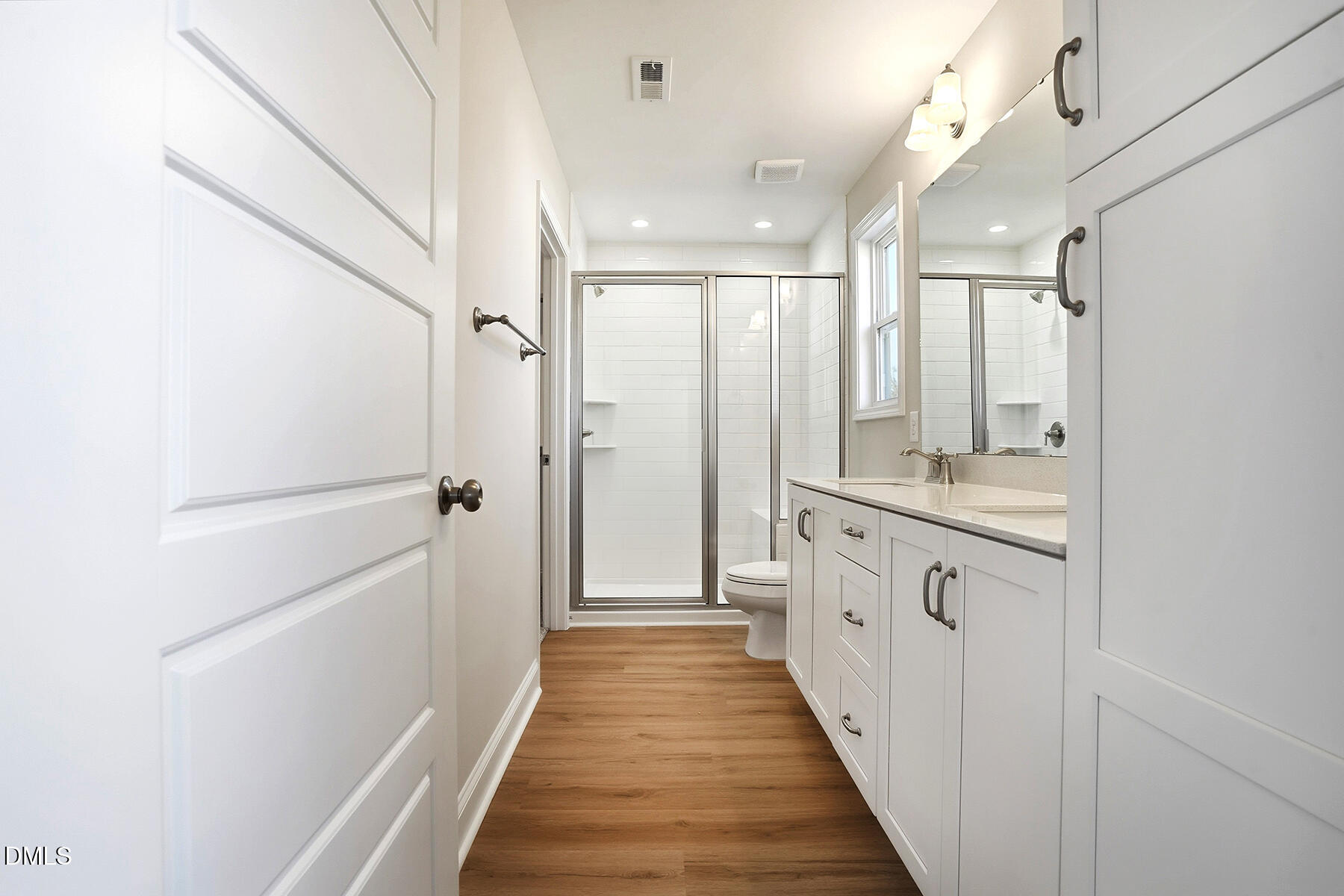 232 Rae Street Warsaw, NC 28398 - Photo 23 of 31 a bathroom with a double vanity sink and mirror