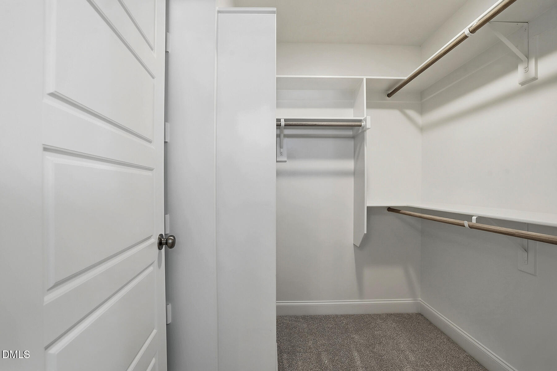 232 Rae Street Warsaw, NC 28398 - Photo 25 of 31 a view of walk in closet with empty racks