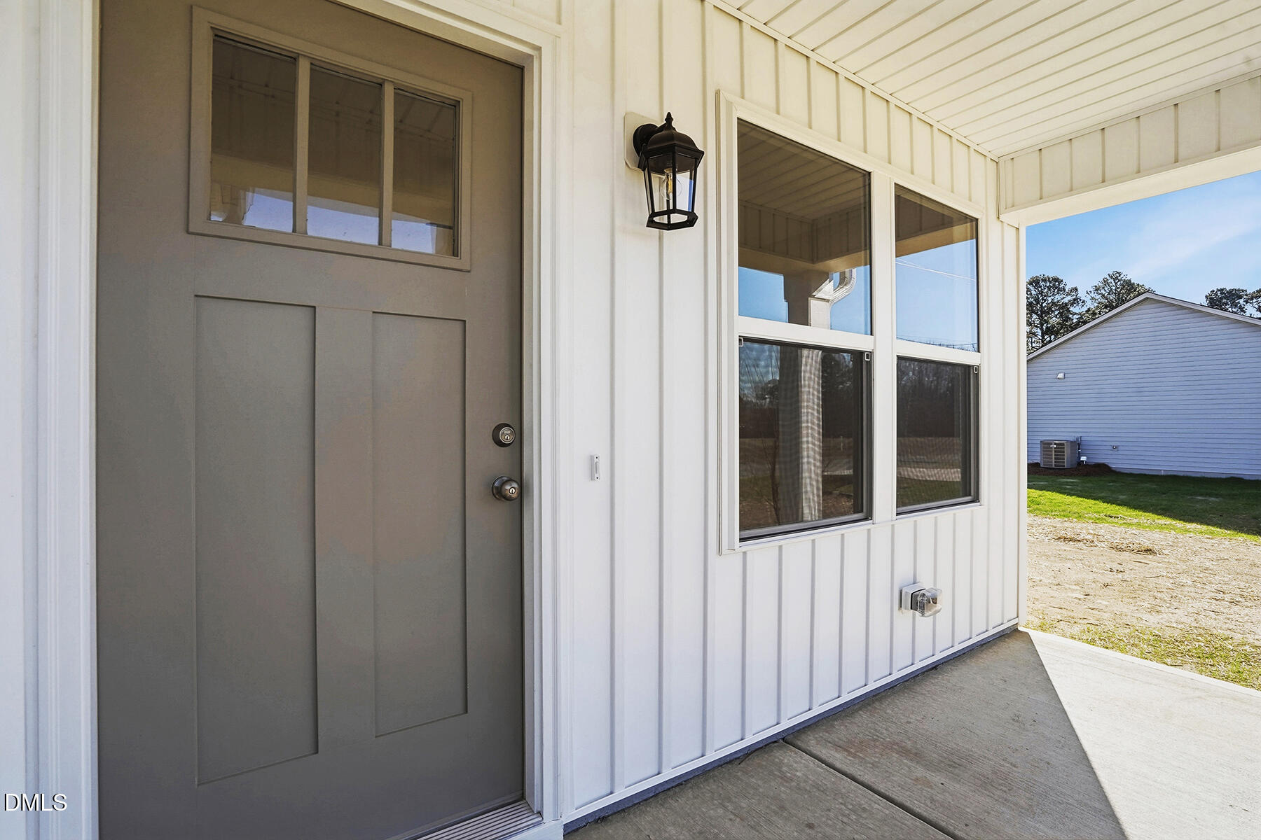 232 Rae Street Warsaw, NC 28398 - Photo 4 of 31 a view of a door house with a small yard