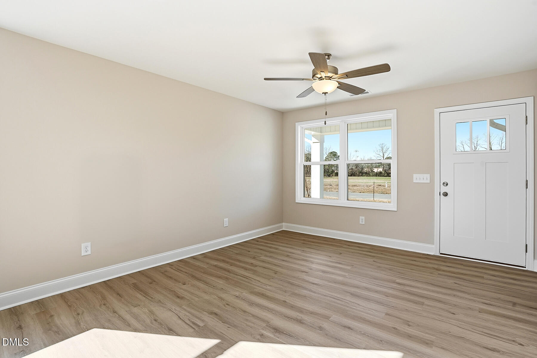 232 Rae Street Warsaw, NC 28398 - Photo 6 of 31 wooden floor in an empty room with a window