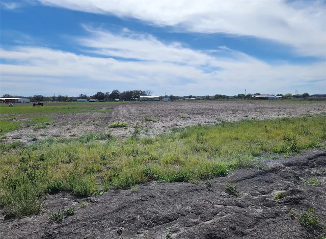 a view of a lake from a yard
