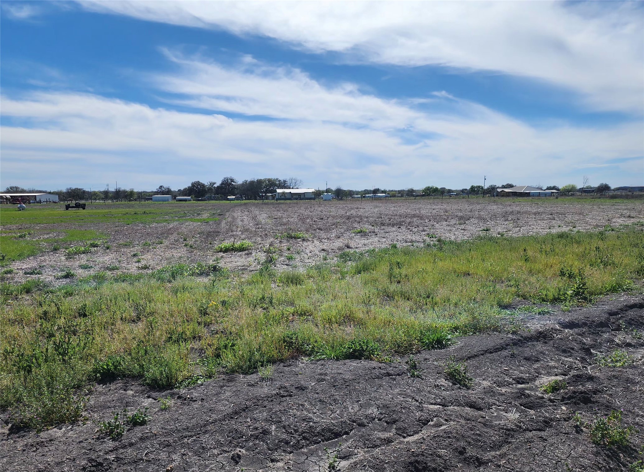 a view of a lake from a yard