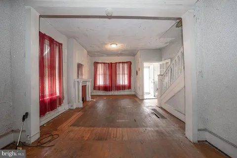 a view of a room with large windows