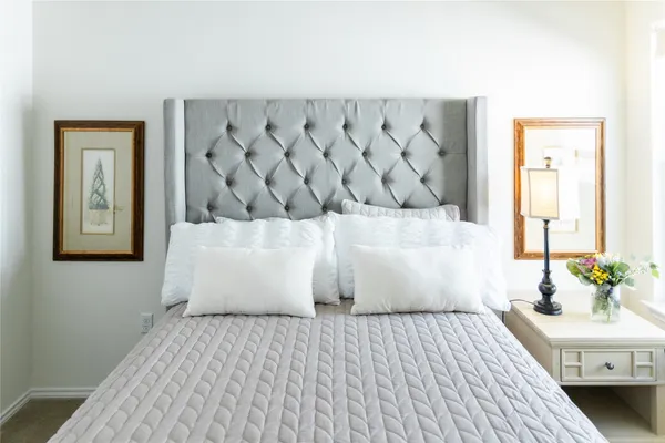 a bathroom with a bathtub and a sink