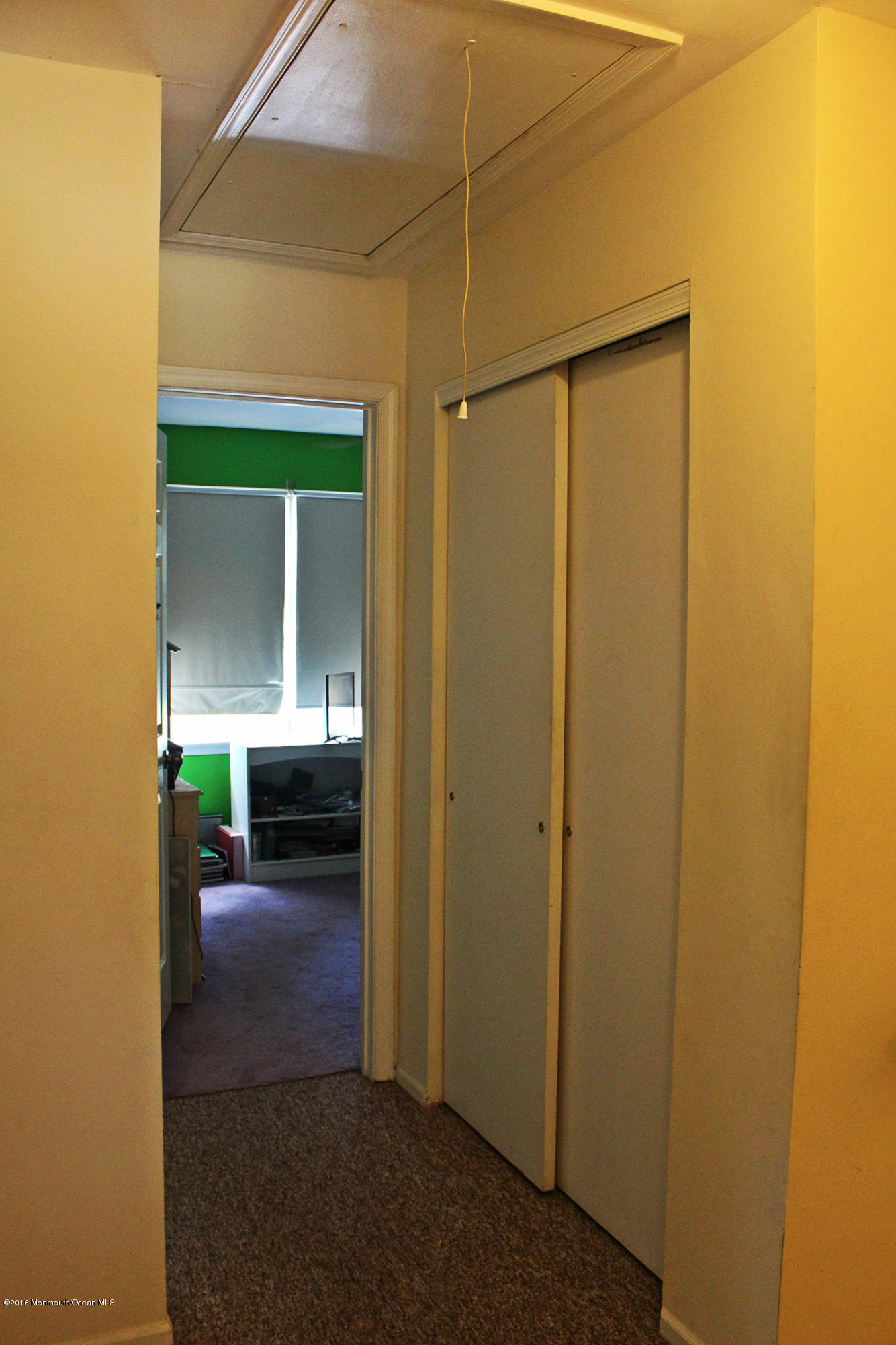 45 Dockage Road Bayville, NJ 08721 - Photo 18 of 29 a view of a hallway to a livingroom with furniture and a window