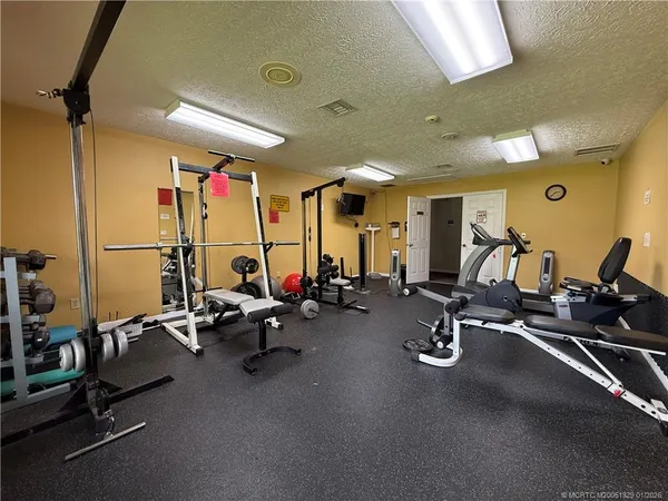 a view of a room with gym equipment