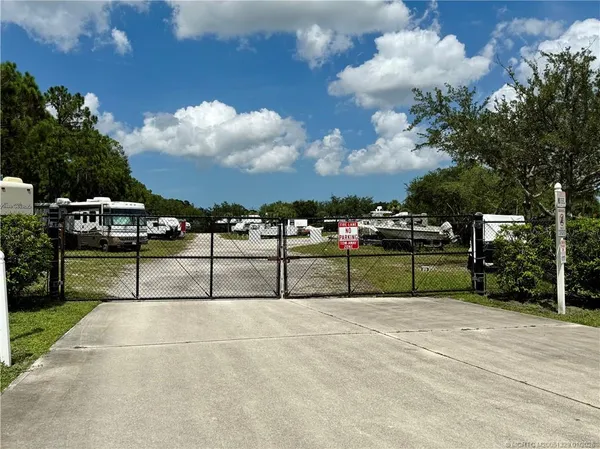 a view of swimming pool with a yard