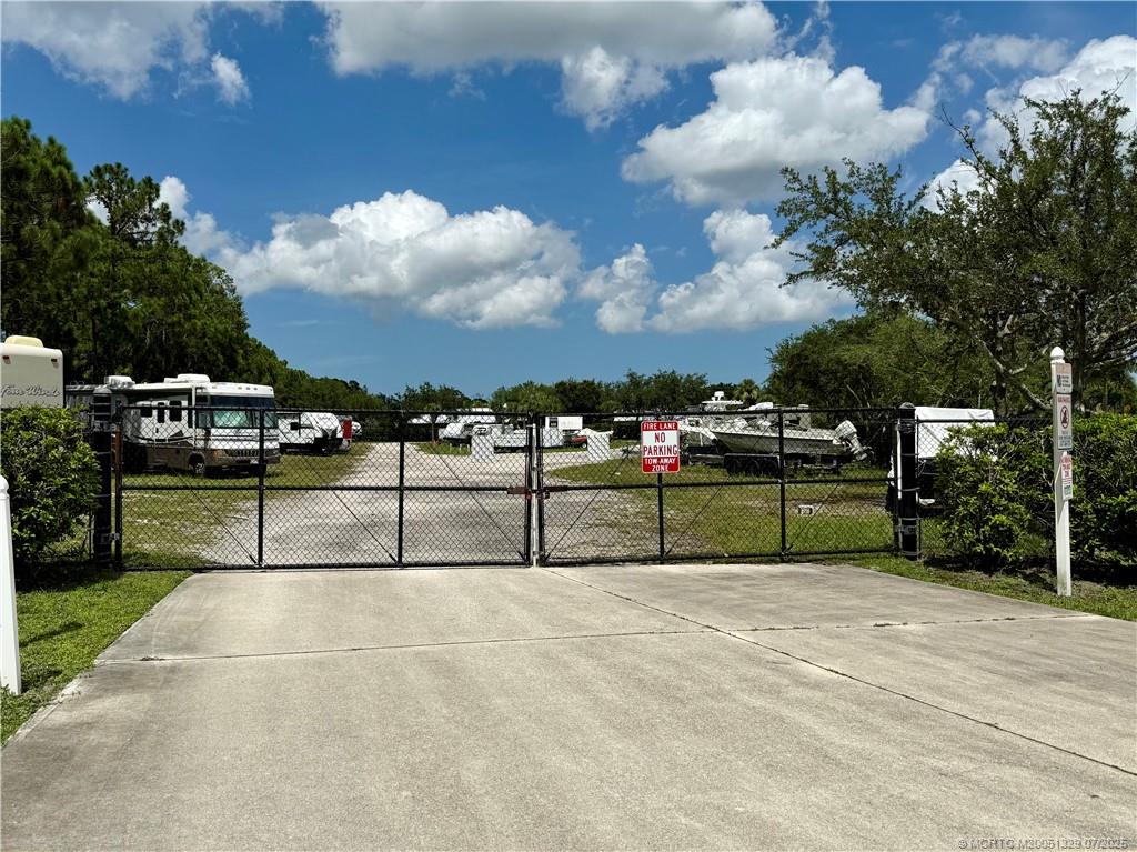 2574 Southwest Monarch Trail Stuart, FL 34997 - Photo 21 of 21 a view of swimming pool with a yard