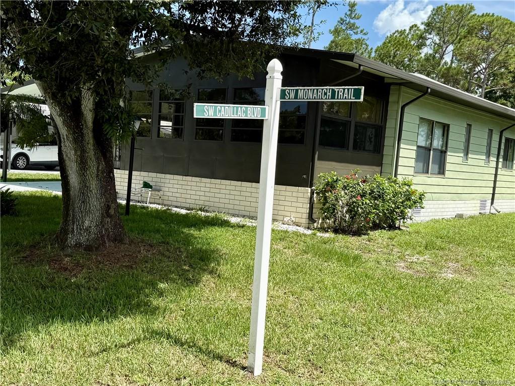 2574 Southwest Monarch Trail Stuart, FL 34997 - Photo 3 of 21 a view of a house with backyard and garden