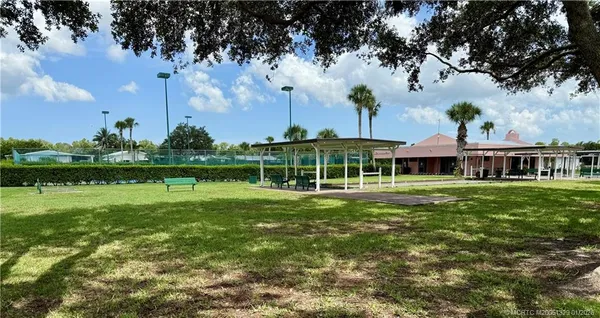 a view of a house with a big yard